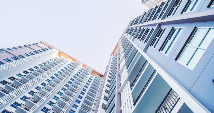 Worm's eye view of skyscraper apartment buildings