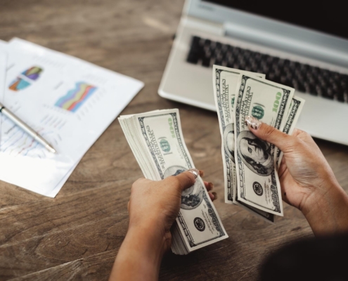 Renter counting money for deposit