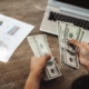 Renter counting money for deposit